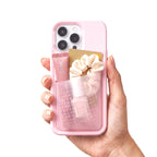 Poche pocket case in pink held in one hand