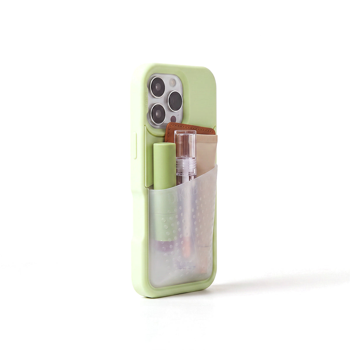 Poche pocket case in pistachio green seen from a three quarter angle