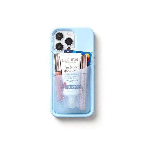 Poche pocket case in pastel blue, seen from above with the stretch pocket full